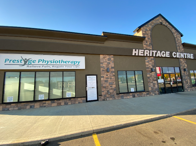 Prestige Physiotherapy storefront at Heritage Centre in Camrose, Alberta — wordmark sign visible on the building
